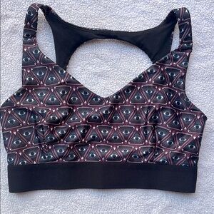 Onzie Women's Black and Burgundy Eye Pattern Sports Bra